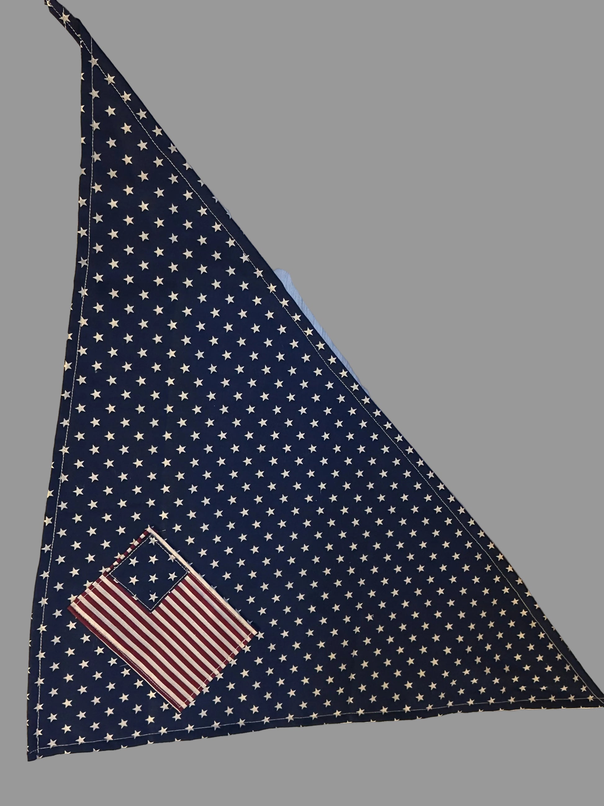 Versatile and stylish navy blue bandana with a classic white star pattern. This is the item to buy to help you ring in the 4th of July with American pride.